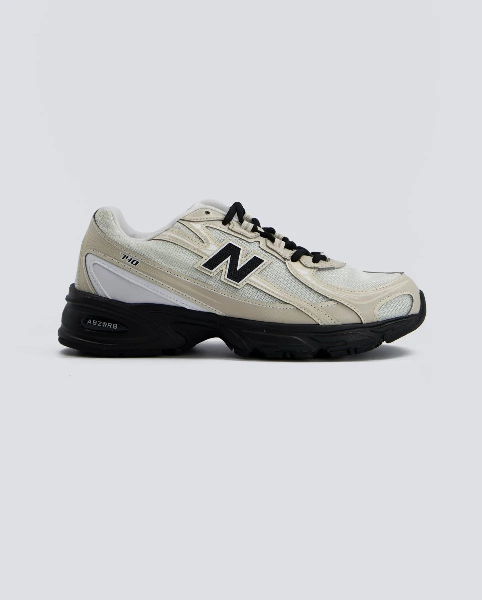 New Balance U7404OO Beiges y Negras Hombre